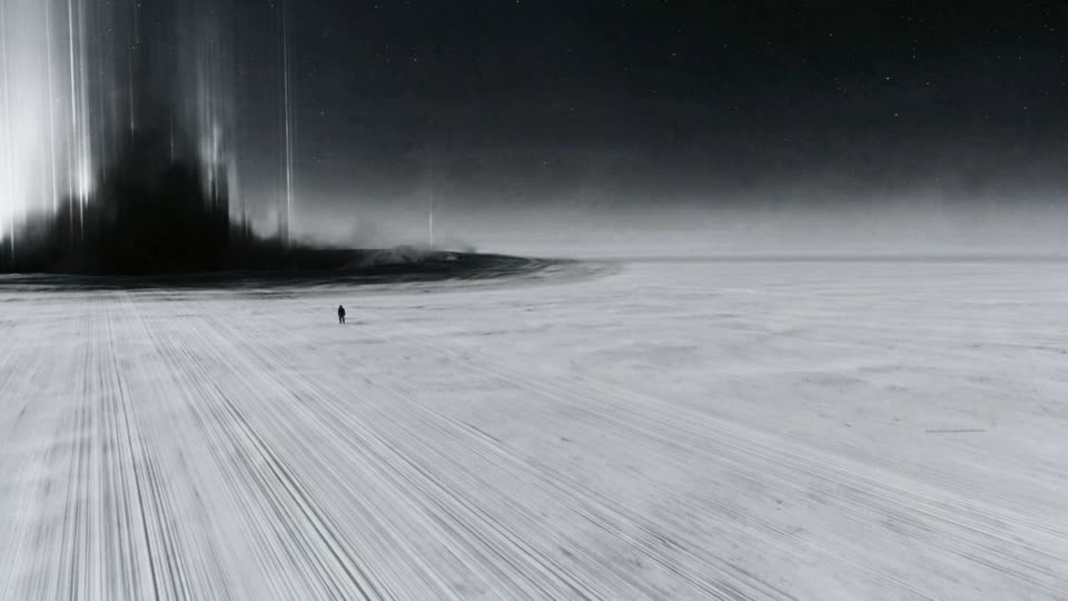 A black-and-white scene of a tiny, lone human figure standing on a vast pale icy plain streaked with long tracks, under a dark starry sky, with a dark mass and streaks of light rising on the left horizon.