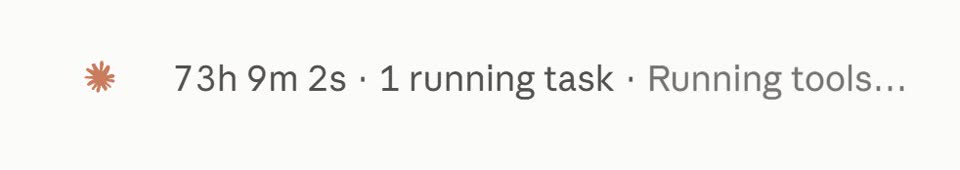 A small orange starburst icon beside the text "73h 9m 2s · 1 running task · Running tools…" on a plain off-white background.